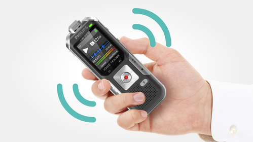 Motion sensor for automatic microphone sensitivity adjustment